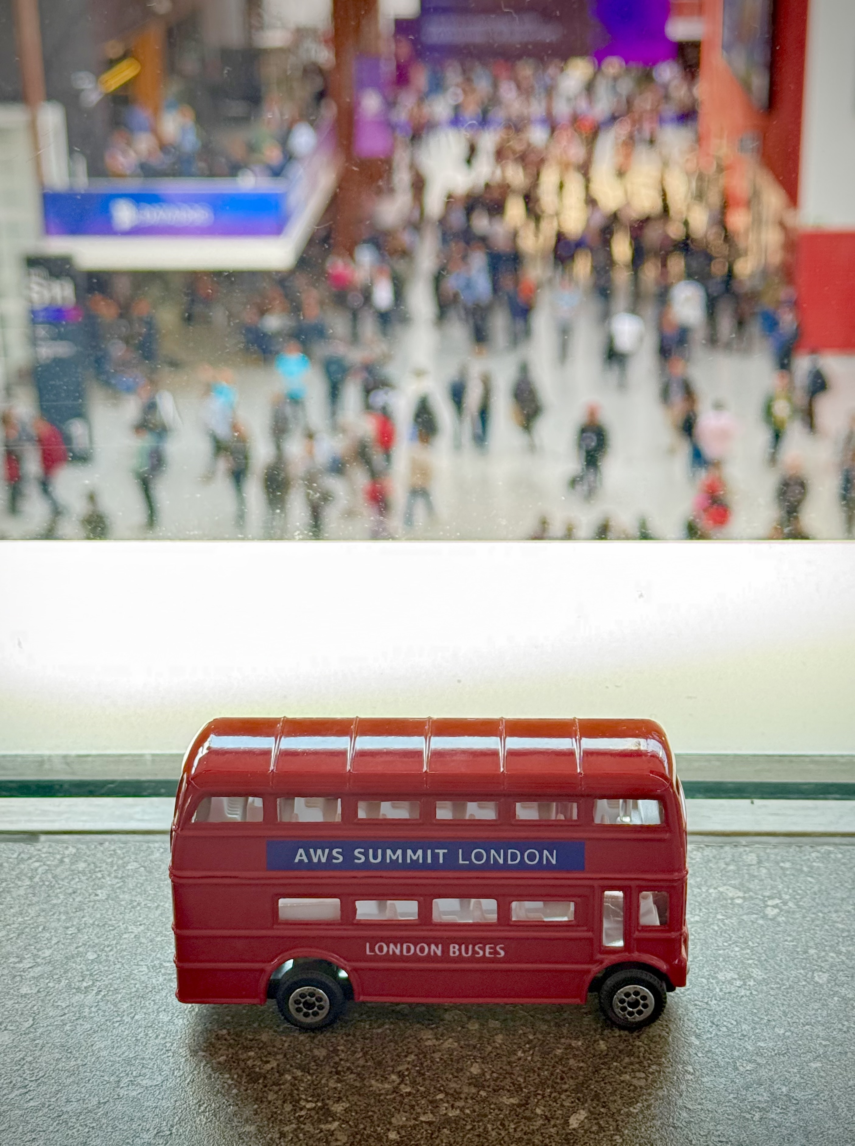 An AWS Summit London toy double-decker bus, a very London souvenir
